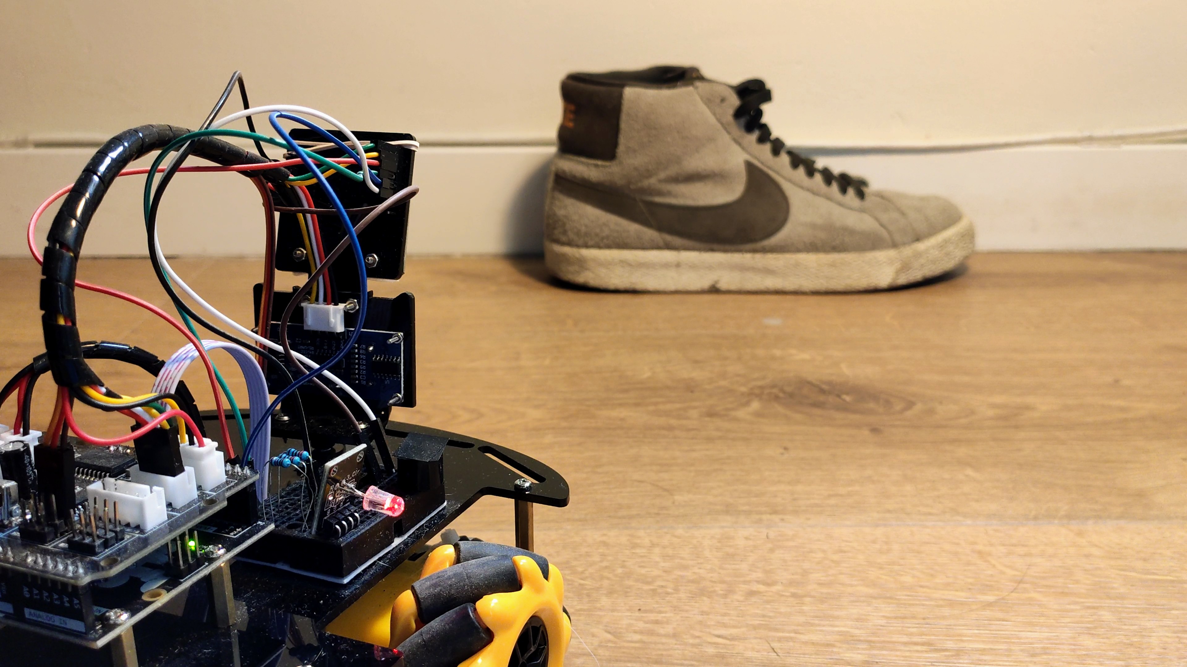 A mobile indoor shoe-detecting robot